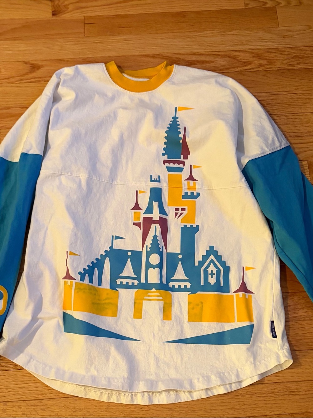 Disney world spirit jersey Castle Graphic- White, Teal & Yellow